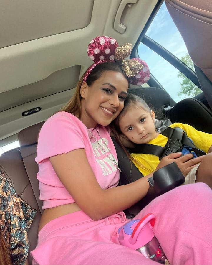 In the pictures, she can be seen in an all-pink outfit, wearing a quirky hairband. (Image Source: Instagram/Nia Sharma)