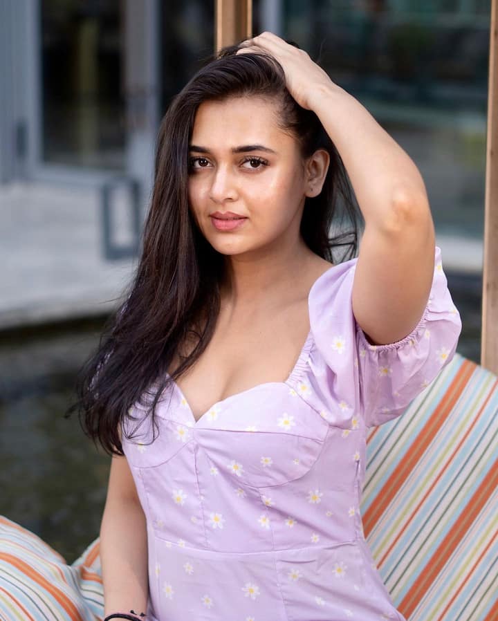 Additionally, she left her hair open as she lounged on a sofa. (Image Source: Instagram/Tejasswi Prakash)