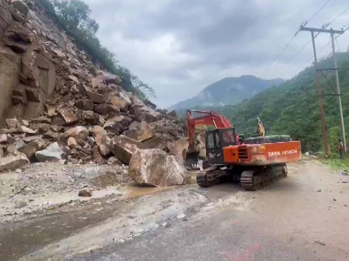 Officials were seen using heavy machinery to clear the highway. Himachal Pradesh’s Disaster Management Principal Secretary Onkar Chand Sharma said six people have died till now, and around 10 people were injured due to heavy rain at several locations in the state. Around 303 animals have also died. According to him, the losses are expected to be Rs 3 crore. (Source: PTI)