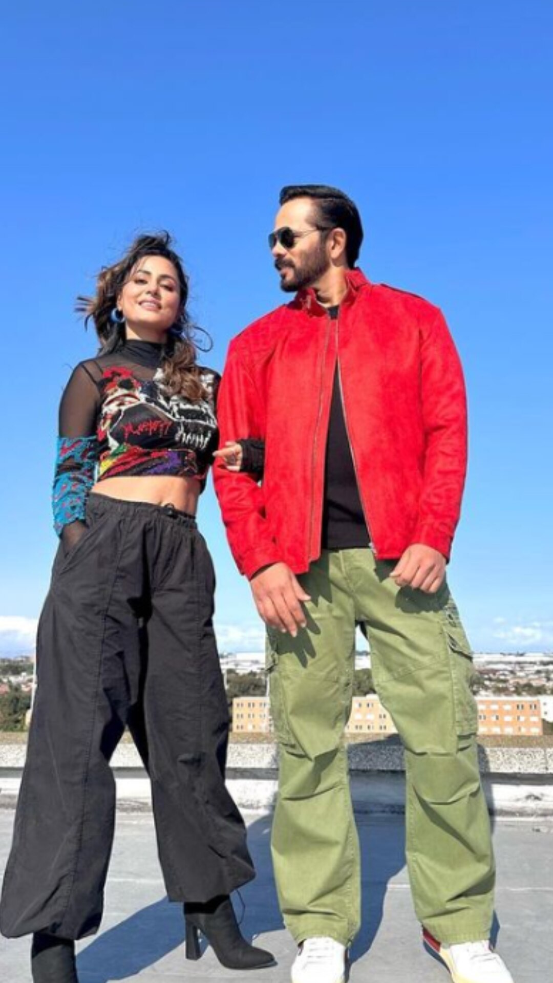 Hina Khan in mesh crop top and cargo pants, poses fearlessly with