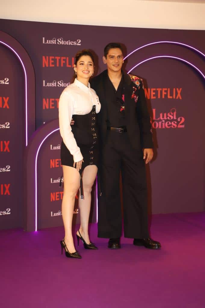 The couple twinned in black outfits. While Vijay went in for an all-black look, Tamannah opted for a white and black corseted outfit that she paired with black heels. Tamannah and Vijay will be seen romancing each other in the ensemble cast film.