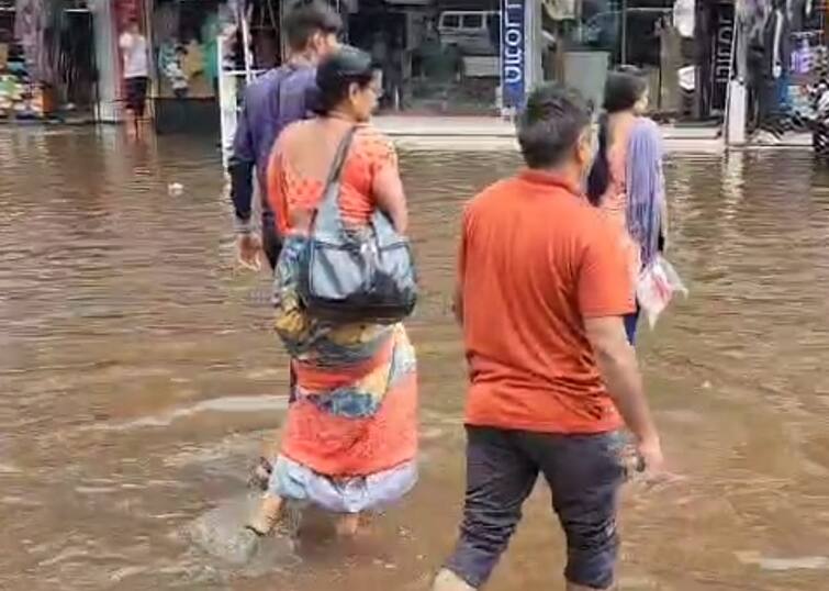 Surat: Due to heavy rains, the market in Chalthan was flooded સુરત: ભારે વરસાદથી ચલથાણમાં જળબંબાકારની સ્થિતિ,  બજાર તળાવમાં ફેરવાયું