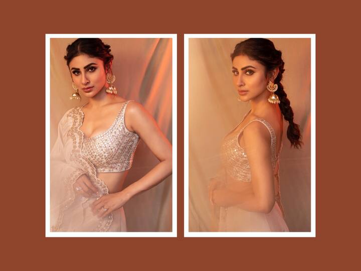 Mouni Roy recently shared pictures on Instagram where she can be seen slaying in an ivory lehenga.