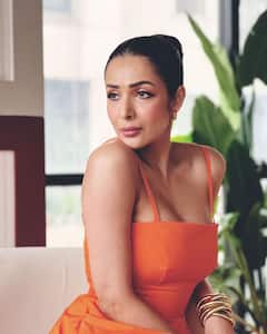 Malaika Arora Dons A Summer-Ready Orange Midi Dress