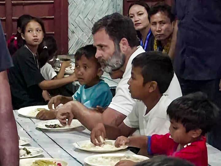 During his visit to Churachandpur, Gandhi interacted with the inmates in relief camps set up at a school and a college there, where around 200 people are camped. (Source: PTI)