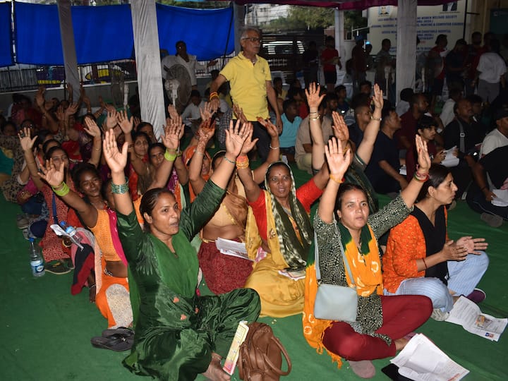 Pilgrims wait for registration of Amarnath Yatra 2023 at Mahajan hall, in Jammu. On-the-spot registration centre has been set up for unregistered pilgrims in Shalimar area of the city. (Source: PTI)
