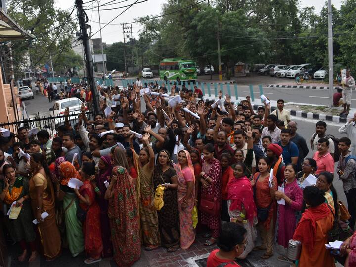 Pilgrims arrive for registration of Amarnath Yatra 2023 at Mahajan hall, in Jammu. (Source: PTI)