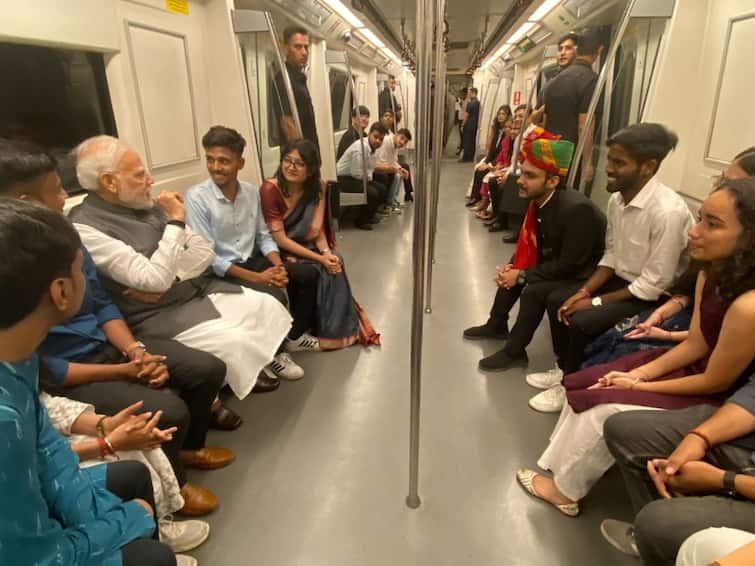 PM Modi interacts people Delhi Metro attend centenary celebrations Delhi University watch