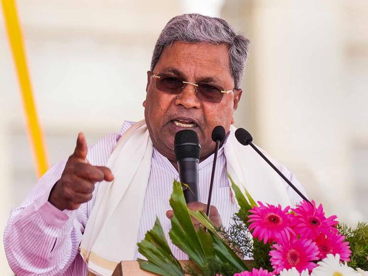 Karnataka Government Congress Anna Bhagya Gruha Jyothi Implementation Free Electricity Karnataka Chief Minister Siddaramaiah Karnataka Govt Launches 'Anna Bhagya', 'Gruha Jyothi' Schemes, 3 Of 5 Poll Guarantees In Place