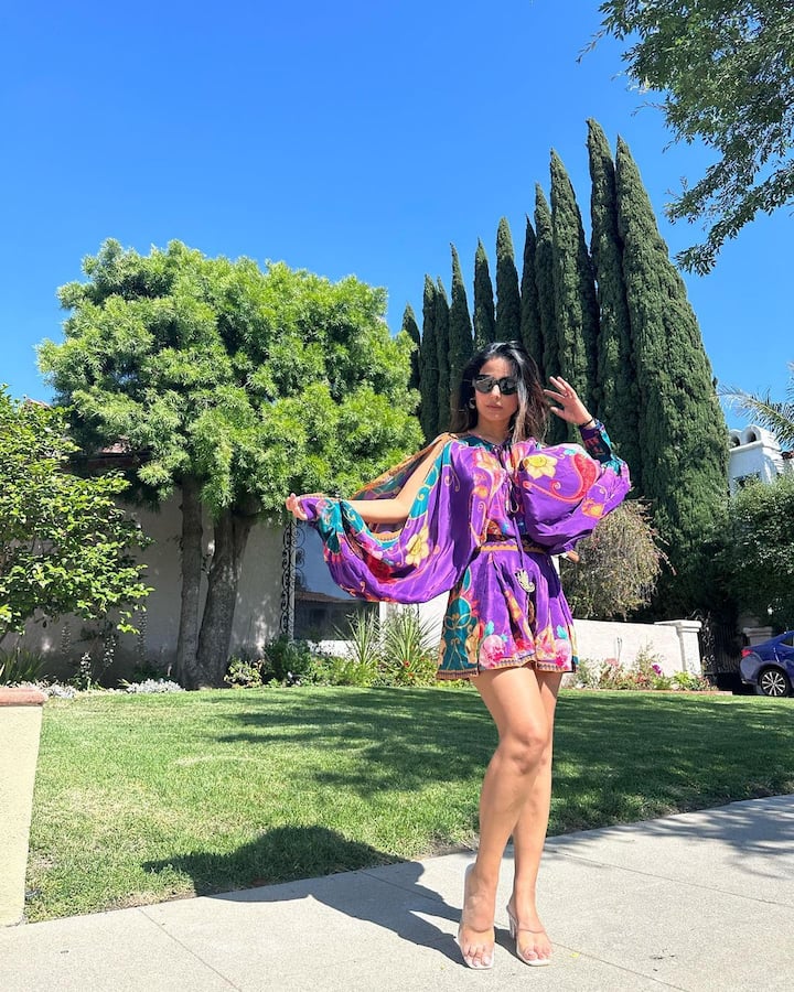 Giving her fans a peek of Rodeo Drive in Beverly Hills, Hina posed in a purple dress with bell sleeves. (Image Source: Instagram/ Hina Khan)