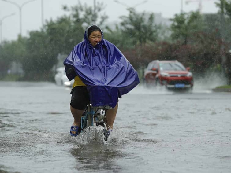 Heavy Flood Chin Beijing Displacement Heavy Rains Properties Damaged Over 10,000 People Displaced, 2,000 Houses Damaged By Heavy Flooding In China's Hunan: Report