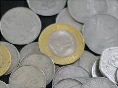 10 रुपये के सिक्के में पीला वाला हिस्सा किसका बना होता है? क्या ये पीतल है?