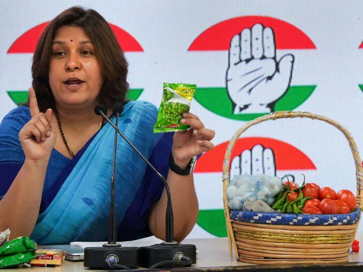 Congress press conference with gift baskets full of tomatoes, ginger, garlic and chillies, told the price