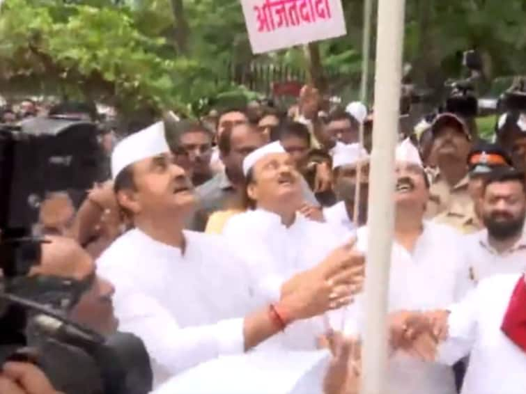 Ajit Pawar Unfurls NCP Flag With Supporters At MET Bandra Ahead Of Crucial Meet. Watch Ajit Pawar Unfurls NCP Flag With Supporters At MET Bandra Ahead Of Crucial Meet. Watch