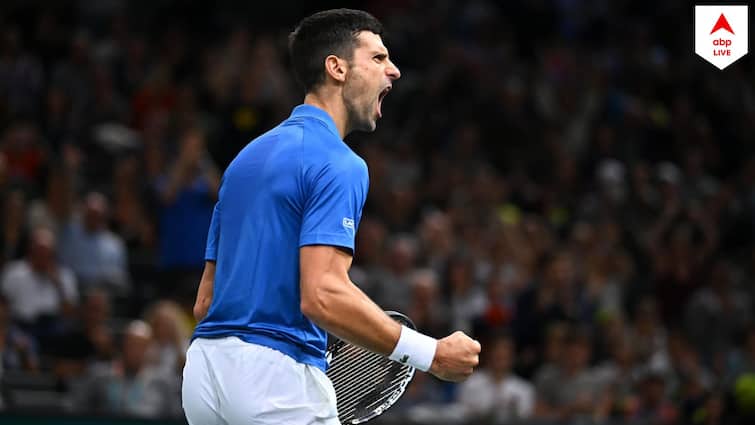 Novak Djokovic celebrates 350th Grand Slam win as climate protesters disrupt rain-hit Wimbledon Novak Djokovic: গ্র্যান্ড স্ল্যামে সাড়ে তিনশো জয়! বিরল কীর্তি গড়লেন জকোভিচ