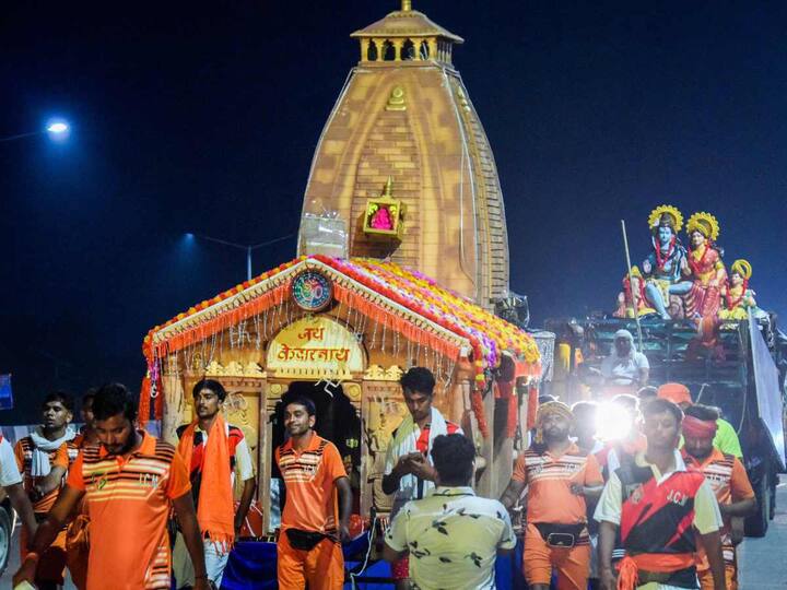 Kanwariyas were also seen pulling a chariot during their pilgrimage in the holy month of 'Shravan' in Haridwar. (Source: PTI)