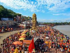 Kanwar Yatra In Haridwar: From Flower Petal Shower Via Helicopter To Devotees Carrying Shiva Linga — In Pics