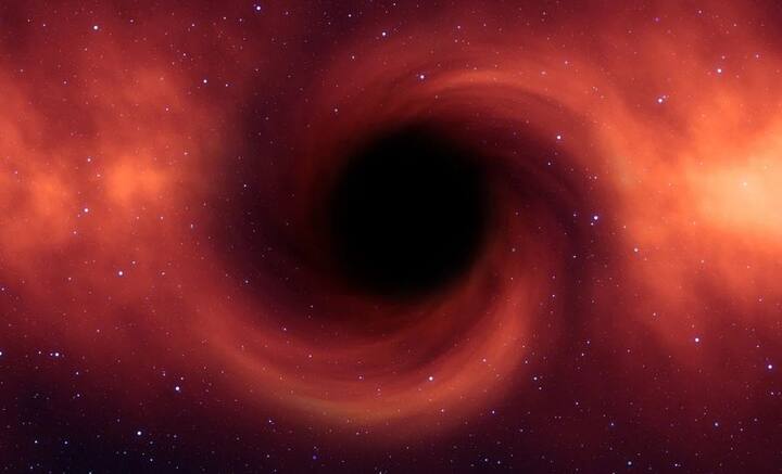 ভোল পাল্টানো ওই কৃষ্ণগহ্বরটিকে J221951 হিসেবে চিহ্নিত করেছেন জ্যোতির্বিজ্ঞানীরা। পৃথিবী থেকে ১ হাজার কোটি আলোকবর্ষ দূরে তার অবস্থান। তবে কয়েক বছর, মাস বা দিন নয়, ব্রহ্মাণ্ডের সূচনাপর্বেই এই ভোলবদল ঘটে। দূরত্বের কারণে এতবছর পর বিষয়টি সামনে এল।