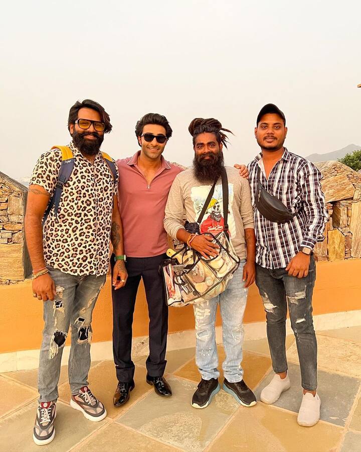 Aadar Jain with his team