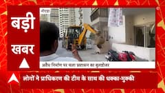 Noida में अवैध निर्माण पर चला बुूलडोजर, लोगों ने प्राधिकरण के लोगों से की धक्का-मुक्की