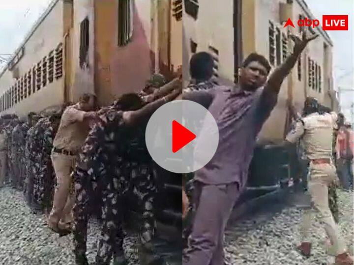 Police and rail staf pushing train like bus indian railway viral video Railway Viral Video: ट्रेन नहीं चली तो सेना के जवानों ने लगा दिया धक्का और कर दिया स्टार्ट! देखें वायरल वीडियो