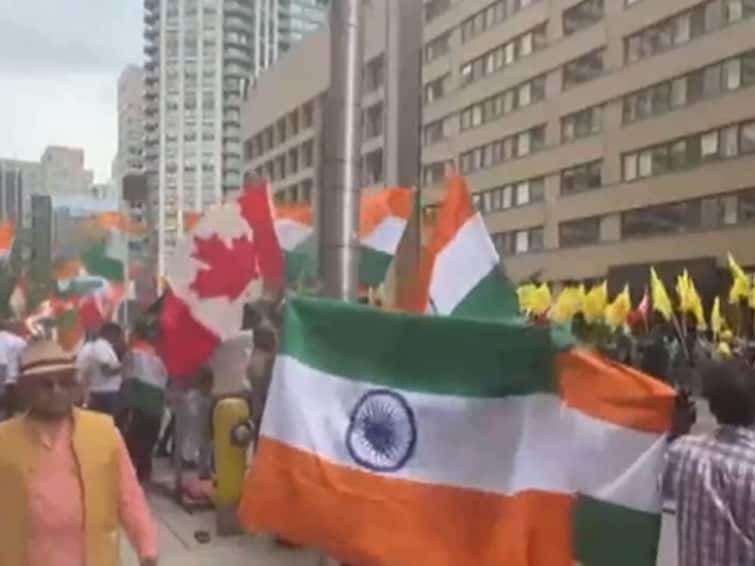 Indian Community Counters Pro-Khalistan Protest With National Flag Outside Indian Consulate In Toronto. Watch Indian Community Waves Tricolour Countering Pro-Khalistan Protest In Canada's Toronto. Watch