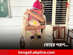 হলে পরীক্ষা দিচ্ছেন মা! বাইরে খুদেকে সামলালেন 'পুলিশ মা'
