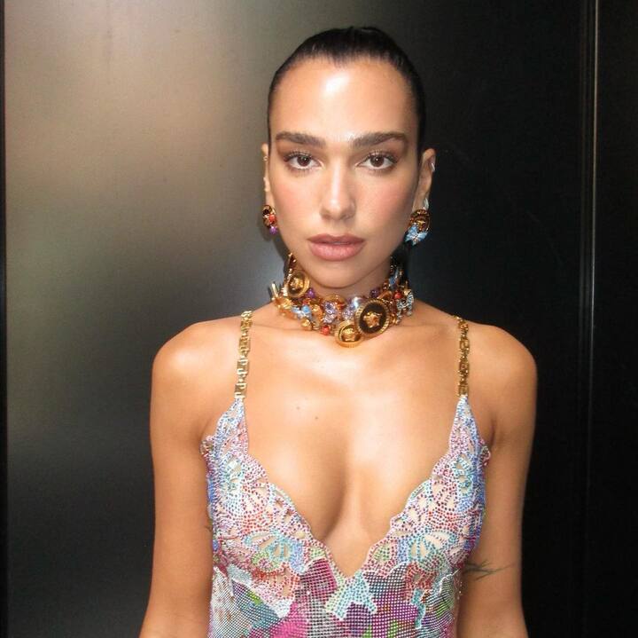 Dua Lipa wore own Versace ‘La Vacanza’ collection at the European premiere of the upcoming film Barbie
