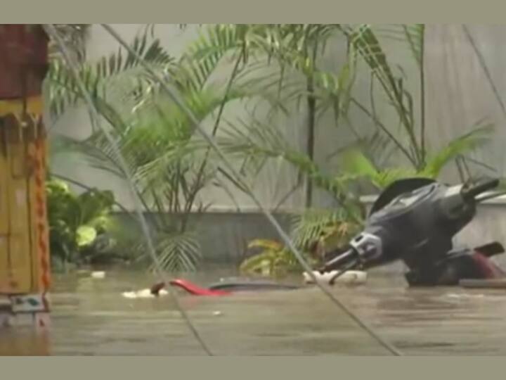 A scooter completely submerged in flood water in Chandgi Ram Akhada Chowk area of Delhi. The Delhi government has banned the entry of heavy goods vehicles, barring those carrying essentials. (Image Source: Twitter/@ANI)