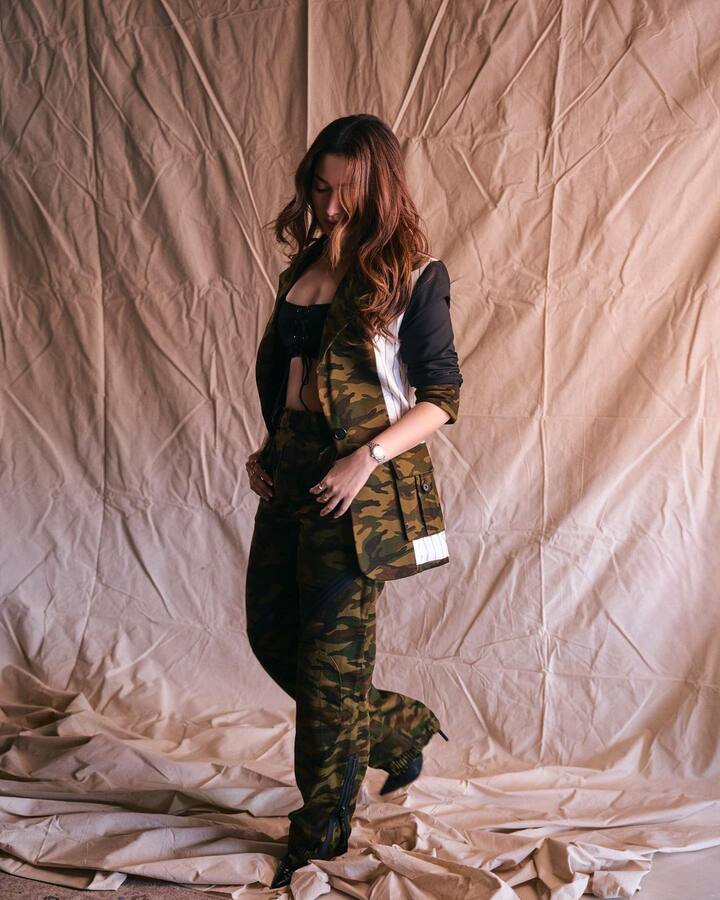 Tamannaah wore a white and black patchwork cut-out blazer.