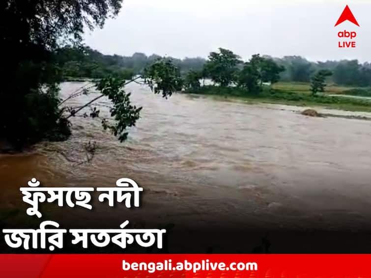 water level is rising on rivers people's lives in North Bengal are disrupted by continuous rains North Bengal Rain Update: বাড়ছে জলস্তর, ফুঁসছে নদী, টানা বৃষ্টিতে বিপর্যস্ত উত্তরবঙ্গের জনজীবন