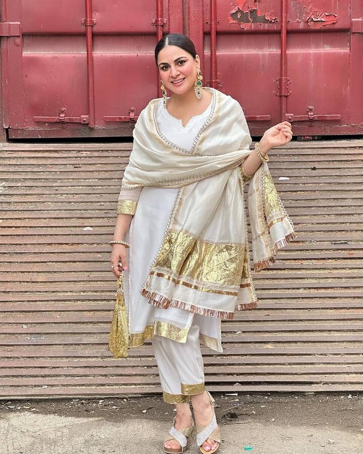 Shraddha wore a white and gold ethnic suit