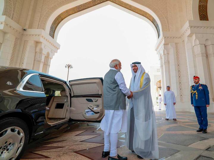 Prime Minister Narendra Modi on his fifth visit to the UAE. He was accorded a ceremonial welcome upon his arrival in Abu Dhabi on Saturday. UAE President Sheikh Mohamed bin Zayed Al Nahyan was seen welcoming him. (Source: PTI)
