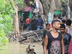 Delhi Flood: नाला फटने से जनता कैंप में भरा पानी, लाखों का सामना हुआ बर्बाद, तस्वीरों में देखें लोगों की परेशानी