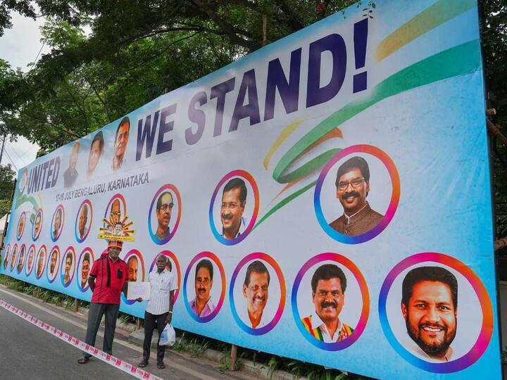 A poster of Opposition leaders was seen put up outside the venue of the united opposition meeting in Bengaluru on Monday. (Source: PTI)