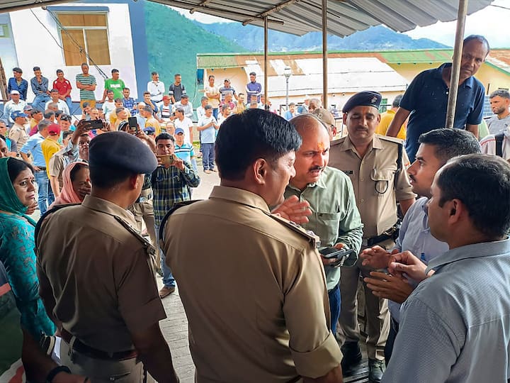 Police personnel and other officials investigate after an accident at a power transformer in Chamoli district. The incident occurred at the site of the Namami Gange project. (Photo Source: PTI)