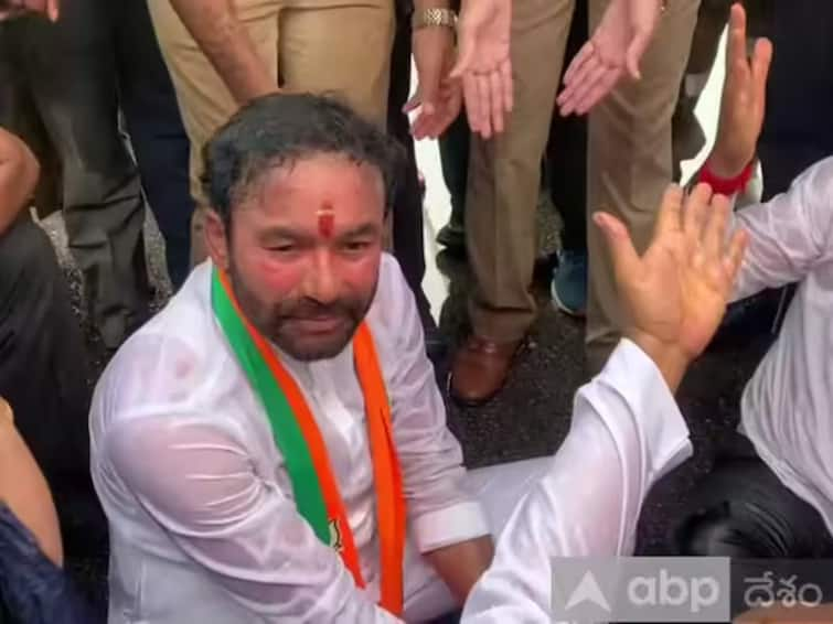 Kishan Reddy Holds Sit-In Protest On Road After Police Stop Him During Visit To Govt Housing Scheme Kishan Reddy Stages Sit-In Protest On Road After Police Stop Him During Visit To Govt Housing Project