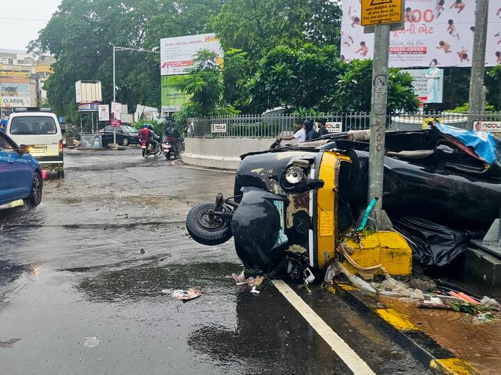 Damaged auto-rickshaw after it collided with an electric post amid heavy monsoon rains, in Junagadh. (Image Source: PTI)
