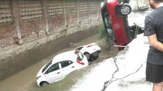 Surat: ભારે વરસાદથી વરાછામાં કમ્પાઉન્ડ વોલ તૂટી, 3 ફોર વ્હીલ ખાડીમાં ખાબકી