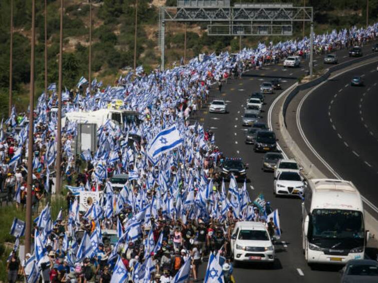 Tens Of Thousands Of Israelis March Against Benjamin Netanyahu's Judicial Reform Bill Hours Before Discussion On It Thousands Of Israelis March Against Netanyahu's Judicial Reform Bill Hours Before Voting