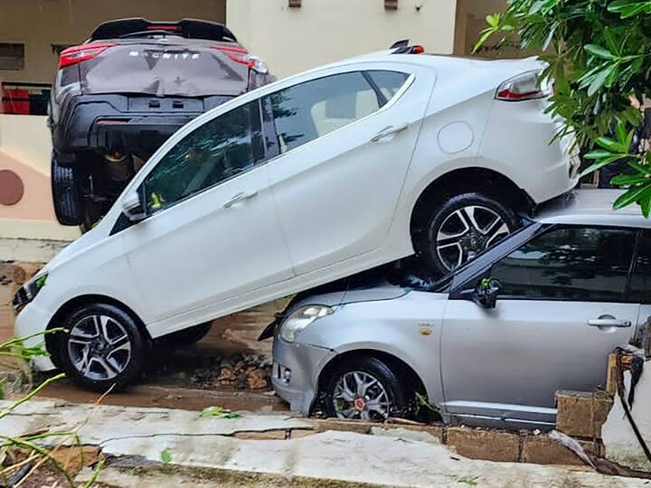 Cars damaged as floodwater entered residential areas following heavy monsoon rains, in Junagadh on Saturday. (Image Source: PTI)
