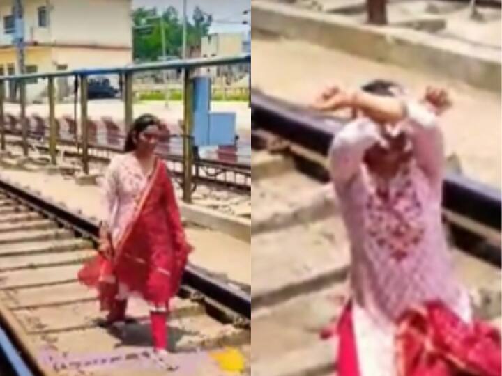 वीडियो बनाने के लिए ट्रेन की पटरी पर उतर गई महिला, बेखौफ होकर करने लगी डांस, पुलिस ने सिखाया सबक- Video Woman Dancing On Railway Track To Make Video Reels Viral Video वीडियो बनाने के लिए ट्रेन की पटरी पर उतर गई महिला, बेखौफ होकर करने लगी डांस, पुलिस ने सिखाया सबक- Video