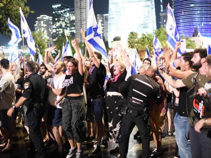 Thousands of anti-government protesters marched from Tel Aviv and converged in Jerusalem outside Parliament as the government's controversial judicial overhaul was voted through. (Source: Getty)