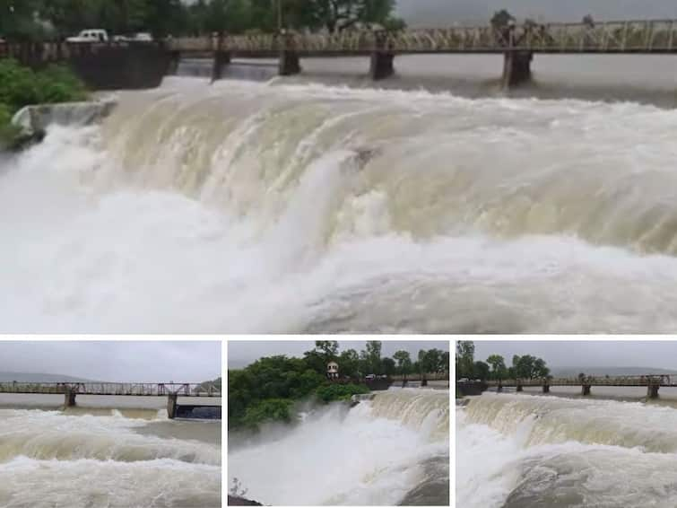 Kolhapur rain update Four gates of Radhanagari dam opened total discharge 7112 cusecs Radhanagari Dam : राधानगरी धरणाचे चार स्वयंचलित दरवाजे उघडले; नदीपात्रात 7112 क्यूसेकनं विसर्ग सुरू, नदीकाठच्या लोकांना सतर्कतेचा इशारा