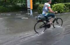 IN PICS: तूफानी बारिश में डूबा दिल्ली-NCR! जाम से लोग बेहाल, तस्वीरों में देखें कब मिलेगी राहत