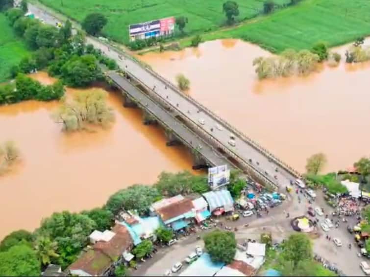 Kolhapur Rain Update Panchganga river level steady in Kolhapur but flood fears remain A gate of Radhanagari dam closed Kolhapur Rain Update: कोल्हापुरात पंचगंगा नदीची पातळी स्थिर, पण मनात पुराची धास्ती कायम; राधानगरी धरणाचा एक दरवाजा बंद 