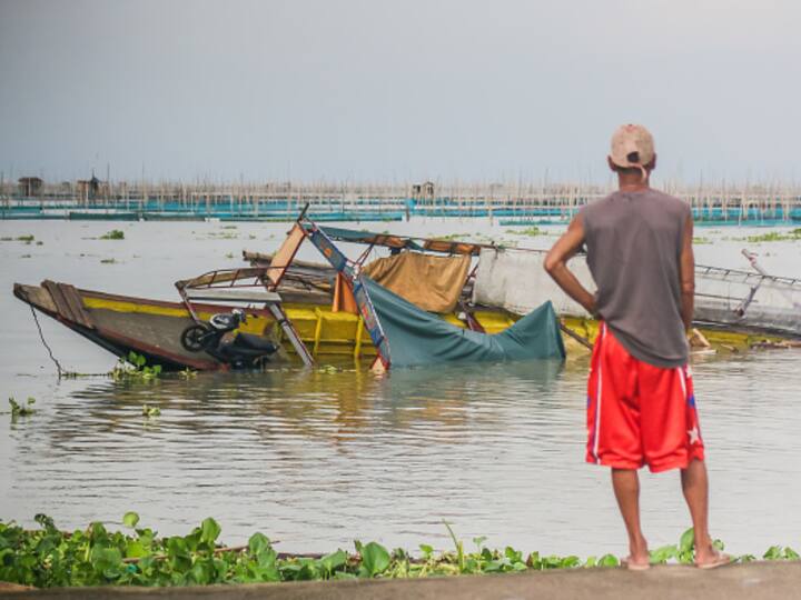 The typhoon pounded the northern Philippines, toppling trees and electricity poles. Widespread electricity cuts have been reported along with landslides and floods. (Source: Getty)
