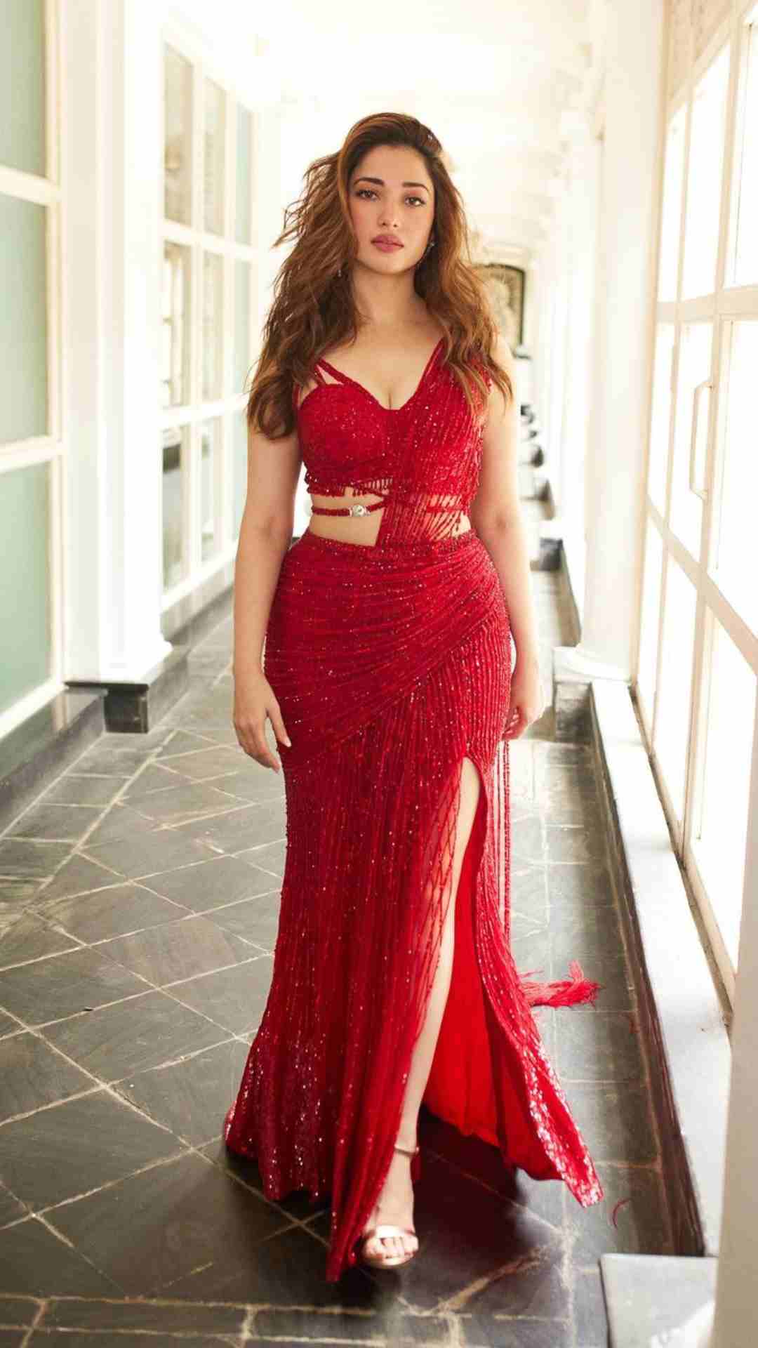 Urvashi Rautela in a red off-shoulder dress looking Gulabo see here pics