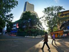 Stock Market: Sensex, Nifty Trade Flat Amid Volatility. Metal Index Gains, FMCG Drags