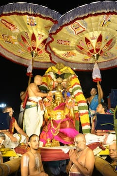 In Pics: garuda seva malayappa swamy on garuda vahanam in tirumala